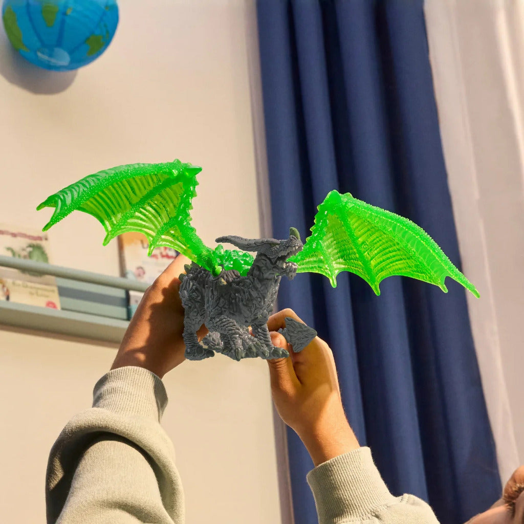 Rock Dragon figure viewed from above showing the mineral plating across its wings and shoulders