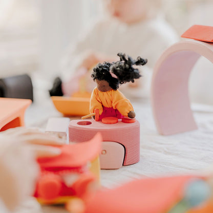 Grimm’s Pink-Orange Mobile Home