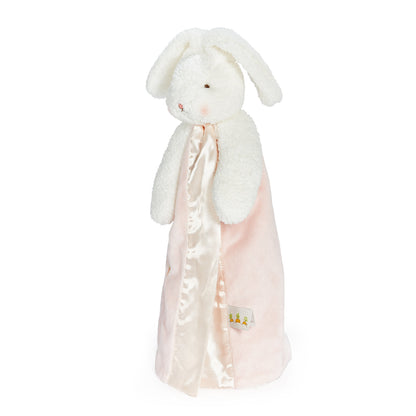 Side view of white plush bunny baby comforter with floppy ears, soft pink blanket, satin panel and embroidered carrot details.