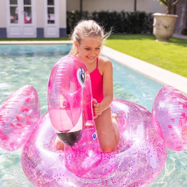 Swim Essentials Neon Pink Flamingo inflatable ride on measuring 150cm with sturdy grab handles for pool and beach adventures