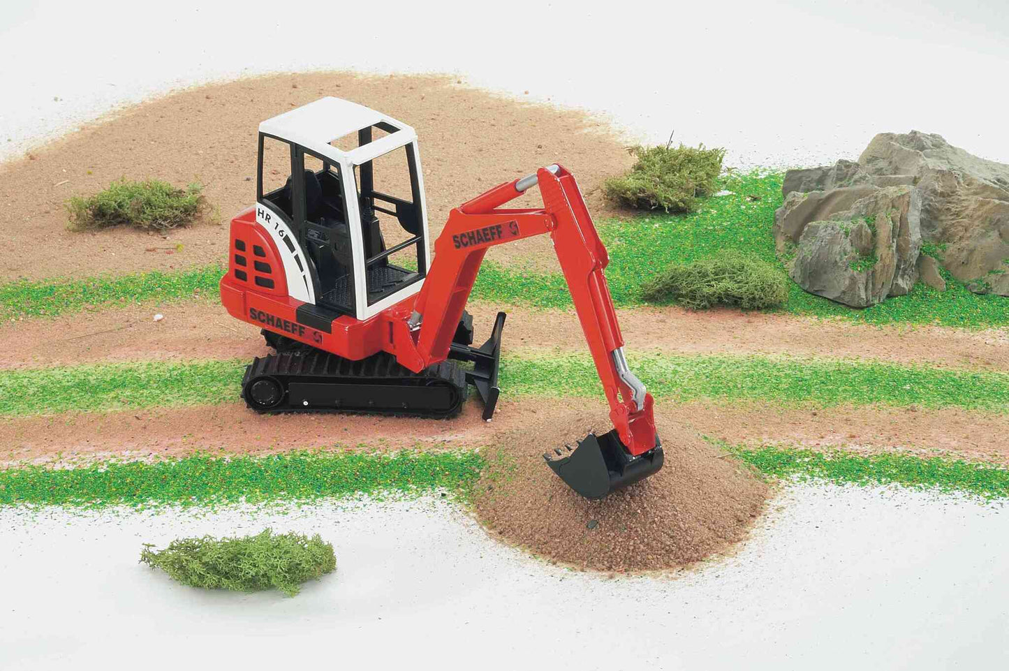 Bruder Schaeff HR16 Mini Excavator 02432 1:16 scale construction vehicle with rotating cab and working excavator arm