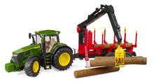 Bruder John Deere 7R 350 tractor with forestry logging trailer, rotating crane and four logs in 1:16 scale