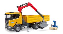 Bruder Scania Super 560R construction truck with rotating crane, tipping tray and two pallets in 1:16 scale