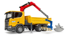 Bruder Scania Super 560R construction truck with rotating crane, tipping tray and two pallets in 1:16 scale