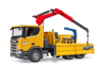 Bruder Scania Super 560R construction truck with rotating crane, tipping tray and two pallets in 1:16 scale