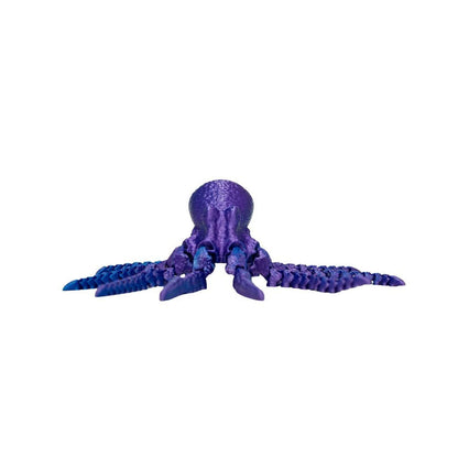 Assorted colourful 3D printed articulated octopus figures with flexible tentacles in display box for sensory and collectible play.