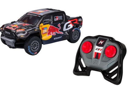 Toyota Gazoo Racing GR DKR Hilux T1+ RC car with Red Bull Dakar 2024 graphics