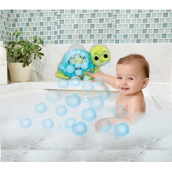 Vtech turtle bath toy in baby bath