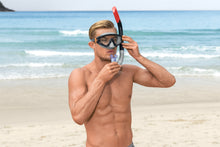 Adult snorkelling in clear open water wearing the mask and snorkel from the Bestway Spark Wave set