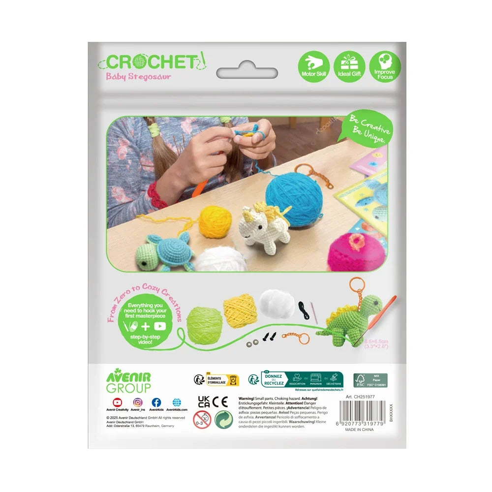Close-up of the Baby Stegosaur crochet keychain with its cute dinosaur-inspired details