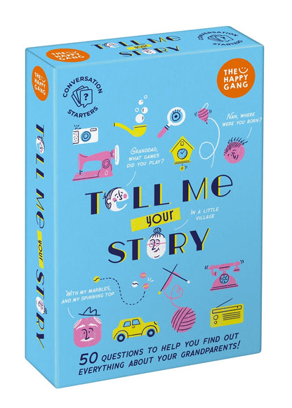 The Happy Gang 'Tell Me Your Story' conversation starters game box, featuring a light blue cover decorated with colorful hand-drawn illustrations of sewing, knitting, and storytelling props.