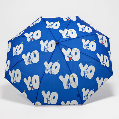 Blue umbrella with white 'YO' pattern on a light gray background