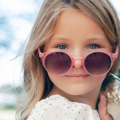Frankie Ray Kids Sunglasses Shine Pink with rounded frame and UV400 smoke lenses for children aged 3 to 8 years