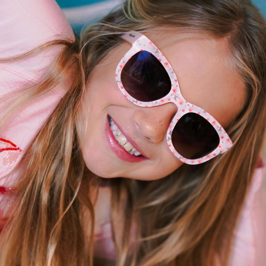 Frankie Ray Kids Sunglasses Blossom Pink with cherry blossom butterfly frame and UV400 smoke lenses for children aged 3 to 8 years