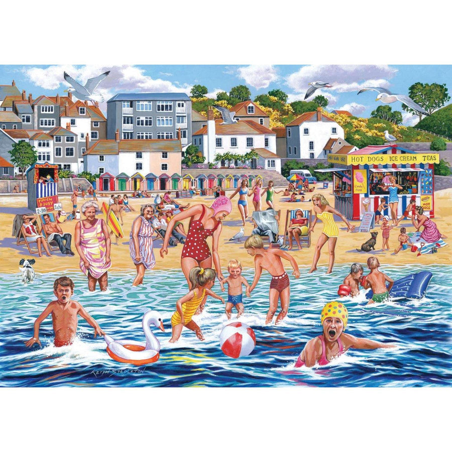 A colorful beach scene illustration showing people swimming, playing, and walking on the sand with houses, trees, and a seaside food stall in the background.