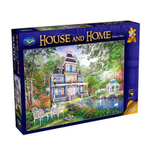 Jigsaw puzzle box titled 'House and Home' with a scenic illustration of a house and garden.