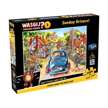 Jigsaw puzzle box titled 'Sunday Drivers!' by Wasgij with a colorful illustration of a village scene on the cover.