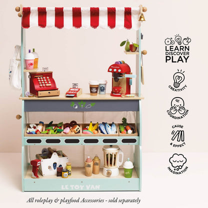 Front view of Le Toy Van Wooden Shop & Café Market Stand with red and white striped canopy, pretend cash register, coffee machine, play food, shopping baskets and grocery displays. Role-play accessories sold separately.