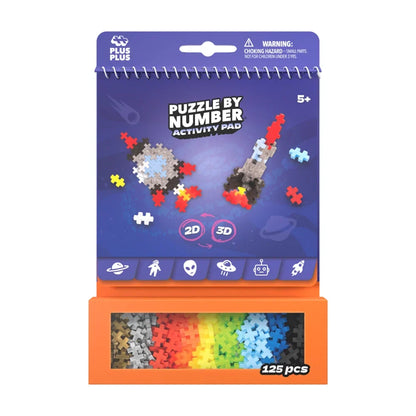 Plus-Plus Puzzle by Number Activity Pad Space shown closed against a white background