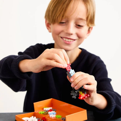Close-up of the built-in storage box and elastic band that keeps the pieces contained