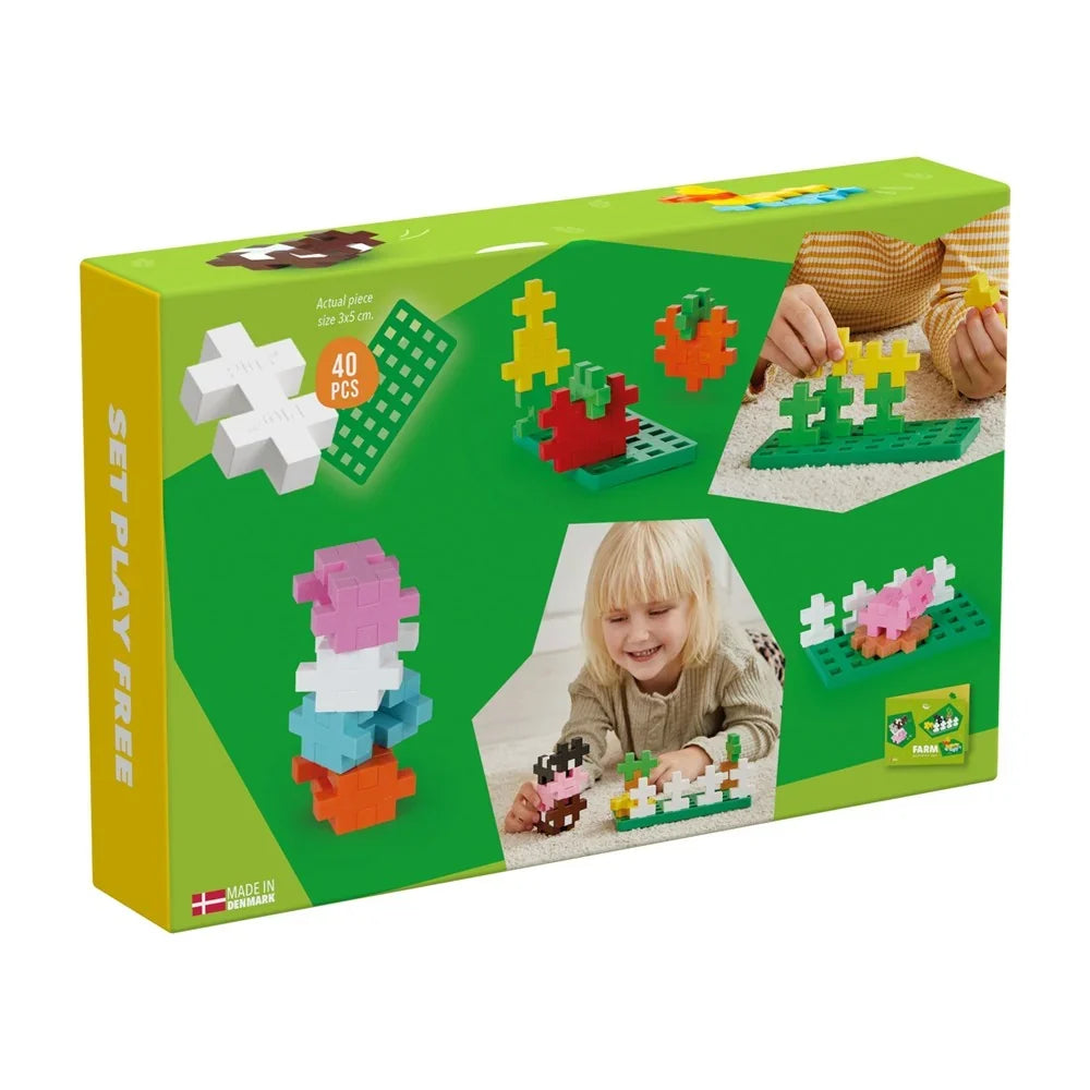 Set contents laid out: 40 chunky BIG pieces, the green baseplate and activity booklet