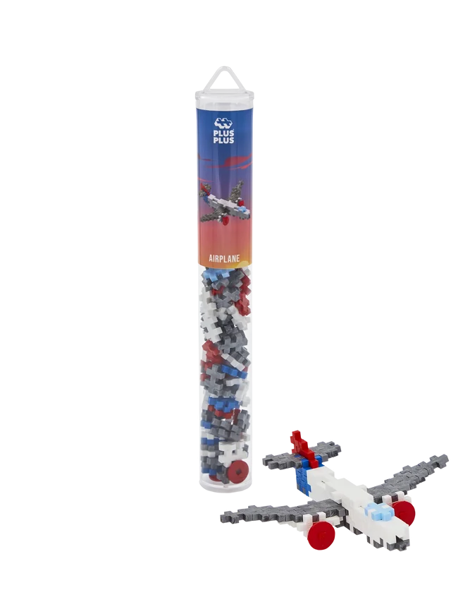 Plus-Plus Airplane 100 piece building tube standing upright against a plain white background