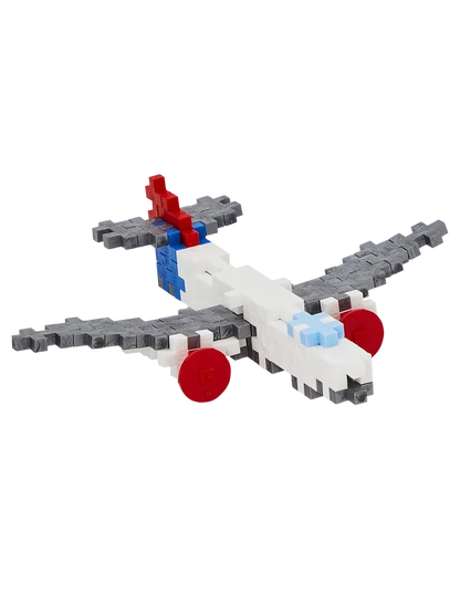 Plus-Plus Airplane 100 piece building tube standing upright against a plain white background