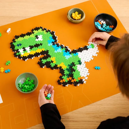 Completed flat mosaic Tyrannosaurus rex built from 250 colourful Plus-Plus pieces