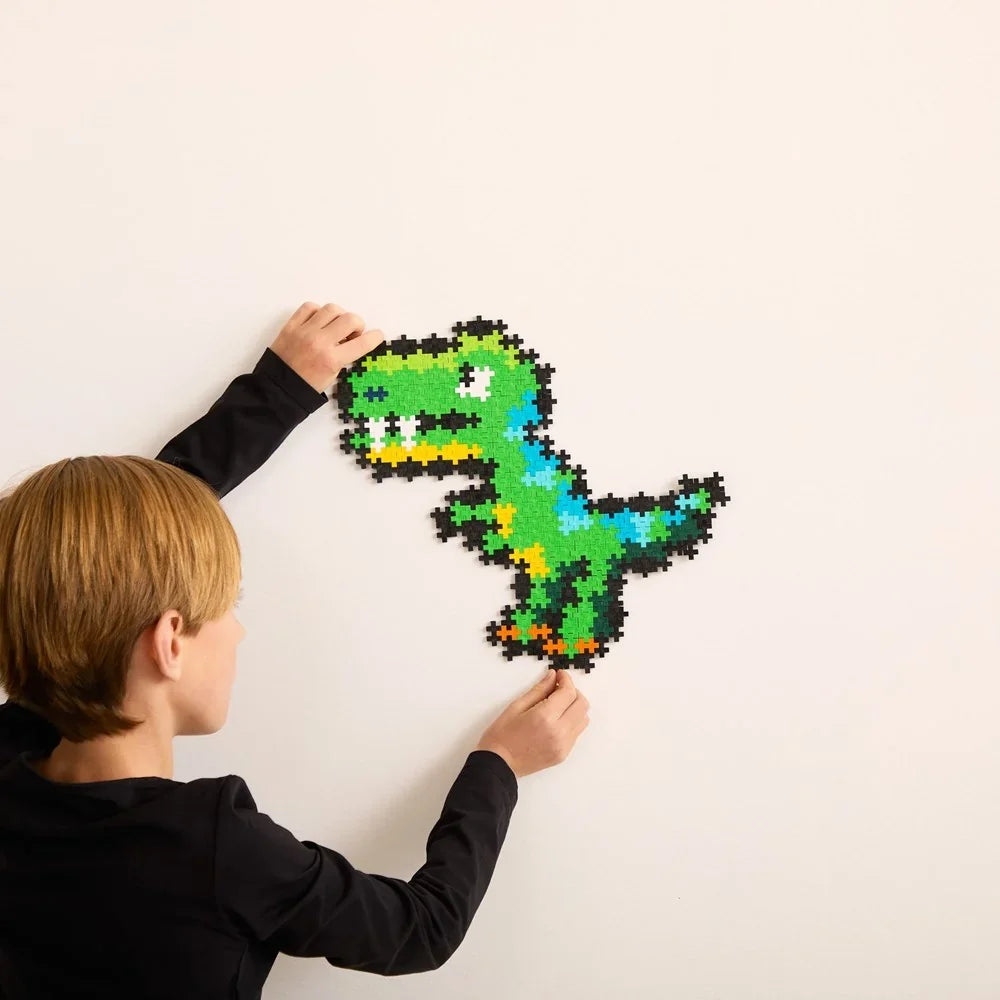 The same Plus-Plus T-Rex assembled as a standing three-dimensional dinosaur figure