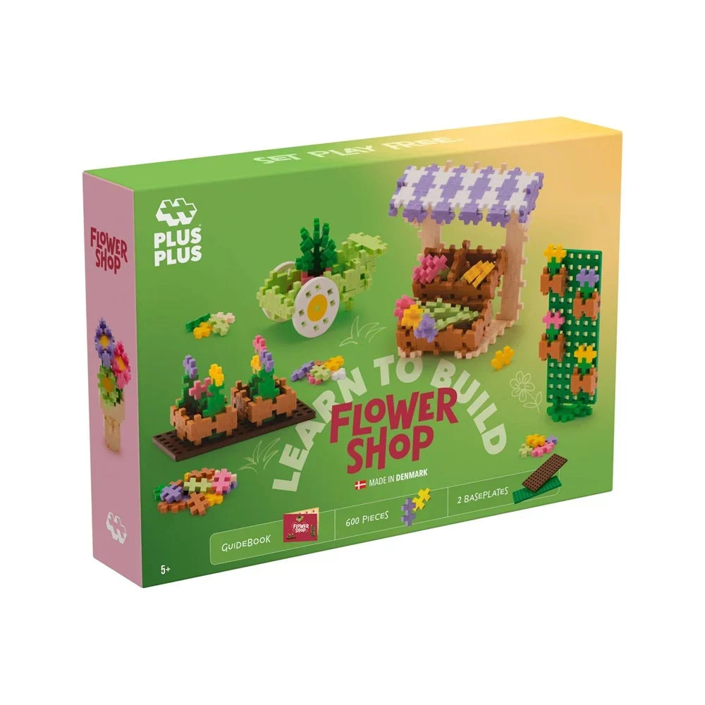 Plus-Plus Learn to Build Flower Shop 600 piece box shown front-on against a white background