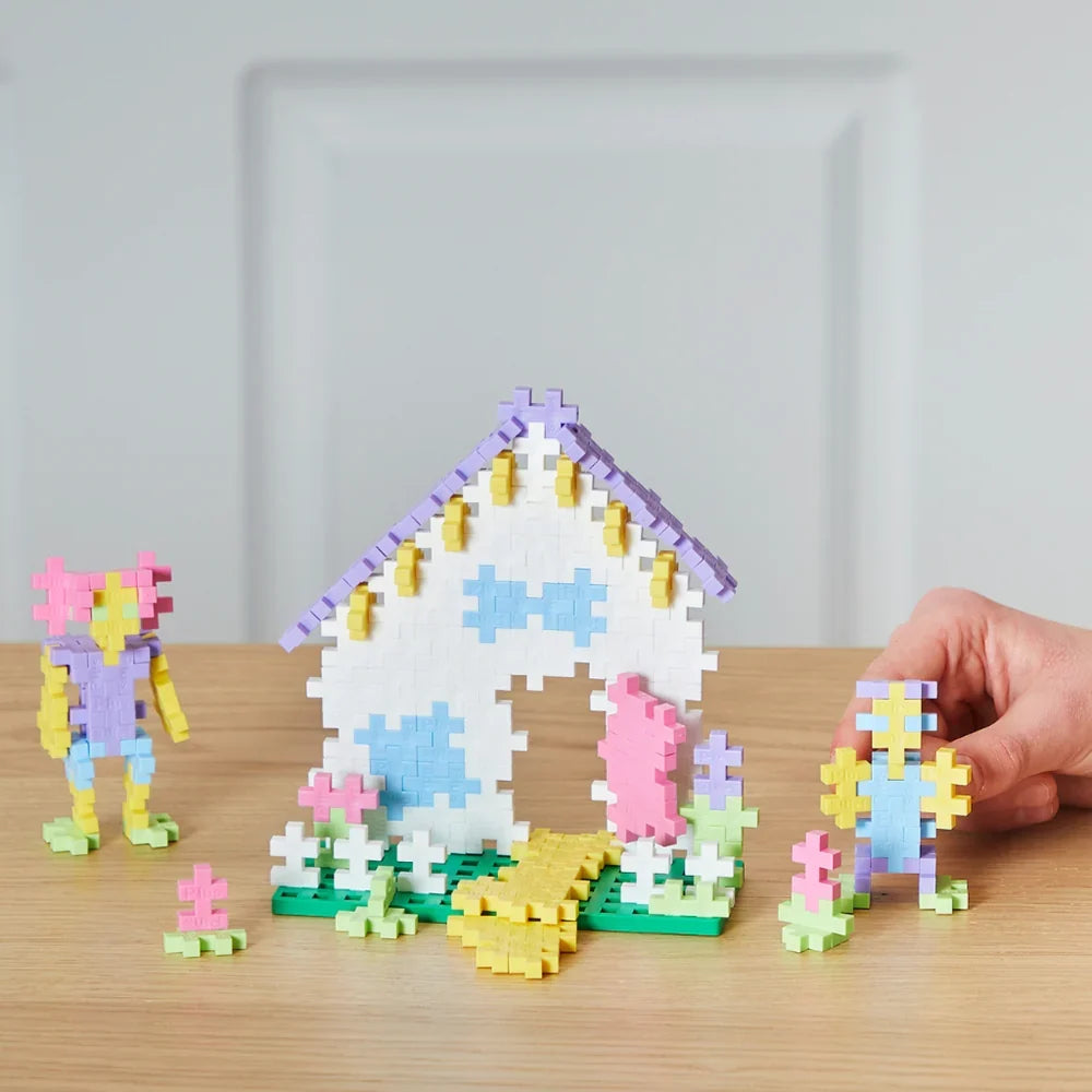 Open guide book showing step-by-step instructions for building a 3D animal from Plus-Plus (89)