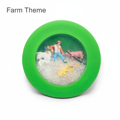 Jellystone Peekaboo Sensory Bag Farm with green silicone exterior and hidden farm themed figurines
