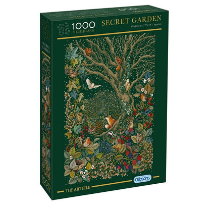 A 1000-piece jigsaw puzzle box titled 'Secret Garden' from The Art File by Geobo. The box is dark green and features a highly detailed, colorful illustration of a forest scene with a large tree, birds, foxes, and foliage.