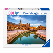 Ravensburger 1000-piece jigsaw puzzle box featuring a scenic photograph of Plaza de España in Seville, Spain, with the blue Ravensburger brand logo on a white background.