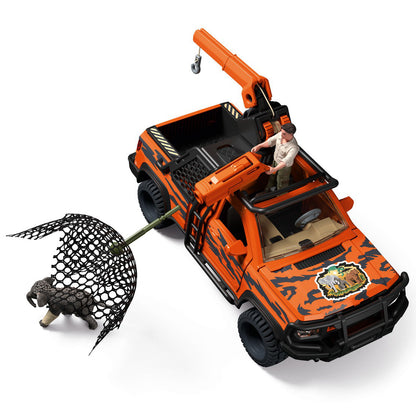 Orange and black toy pickup truck with a crane and net accessory, shown on a white background with a small driver figure inside.