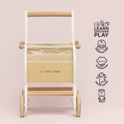 Wooden toy ladder with 'Le Toy Van' branding on a pink background