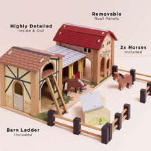 Le Toy Van Wooden Farmyard Set showing removable roof panels, detailed barn interiors, wooden hay loft ladder, two included horses and fenced paddocks.