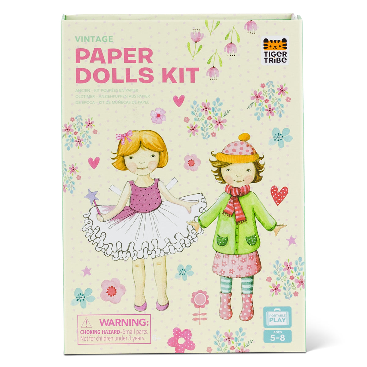 Vintage paper dolls kit packaging with two dolls on a floral background