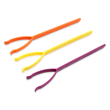 ARK proSqueezer lip, tongue and jaw exerciser set in magenta, yellow and orange resistance levels