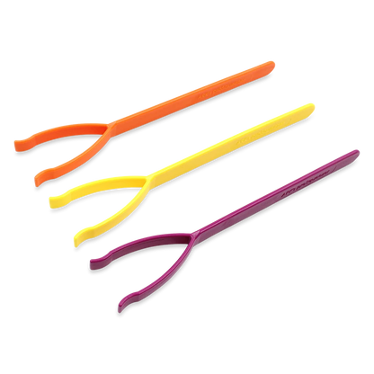ARK proSqueezer lip, tongue and jaw exerciser set in magenta, yellow and orange resistance levels