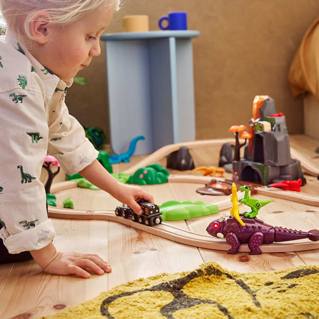 BRIO World Dinosaur Attack Set featuring light and sound Ankylosaurus, two Velociraptors and cargo wagon
