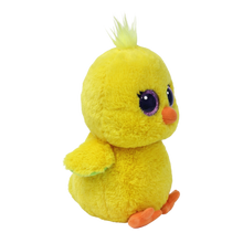 Side view of the Chirps the Yellow Chick Regular 15cm Ty plush with the red Ty Heart swing tag attached