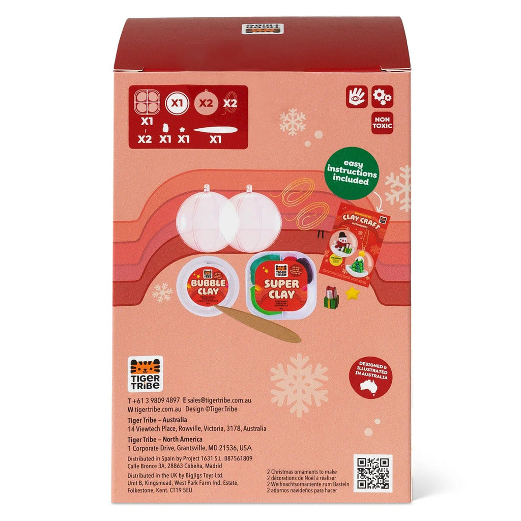 Snowman and tree clay ornament kit shown in its retail packaging with contents and age guidance