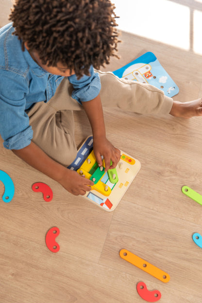 Full contents of the Goula Colour Forms game unpacked: base, sheets, shapes and sticks