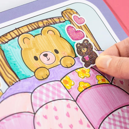 A completed colouring page with stickers added, showing one finished magical mini world scene