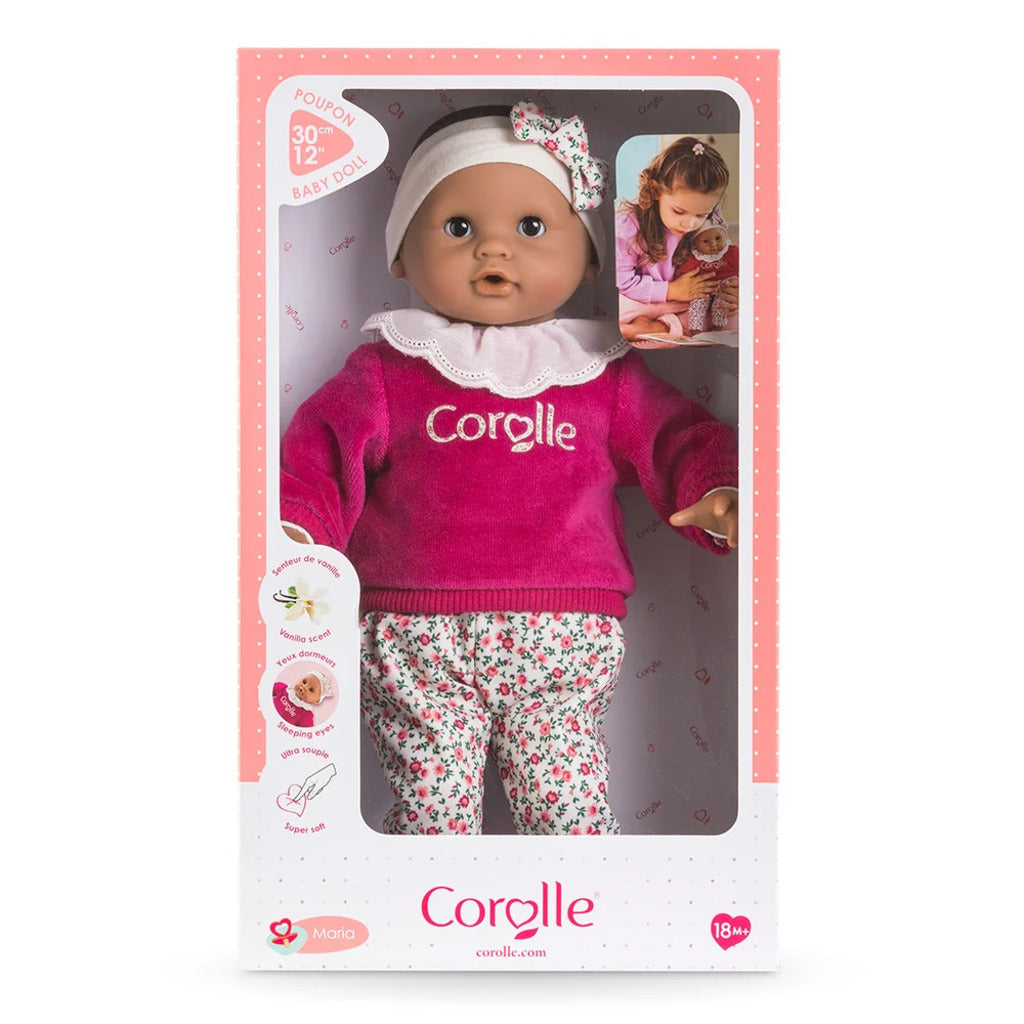 Close-up of the Bebe Calin Maria soft vinyl face and hands, a first doll for toddlers from 18 months