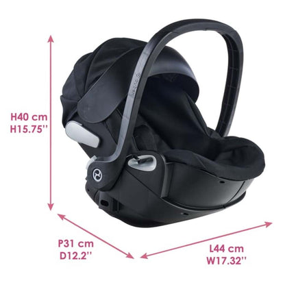 36cm Corolle baby doll held against the chest in the black Corolle x Cybex doll carrier
