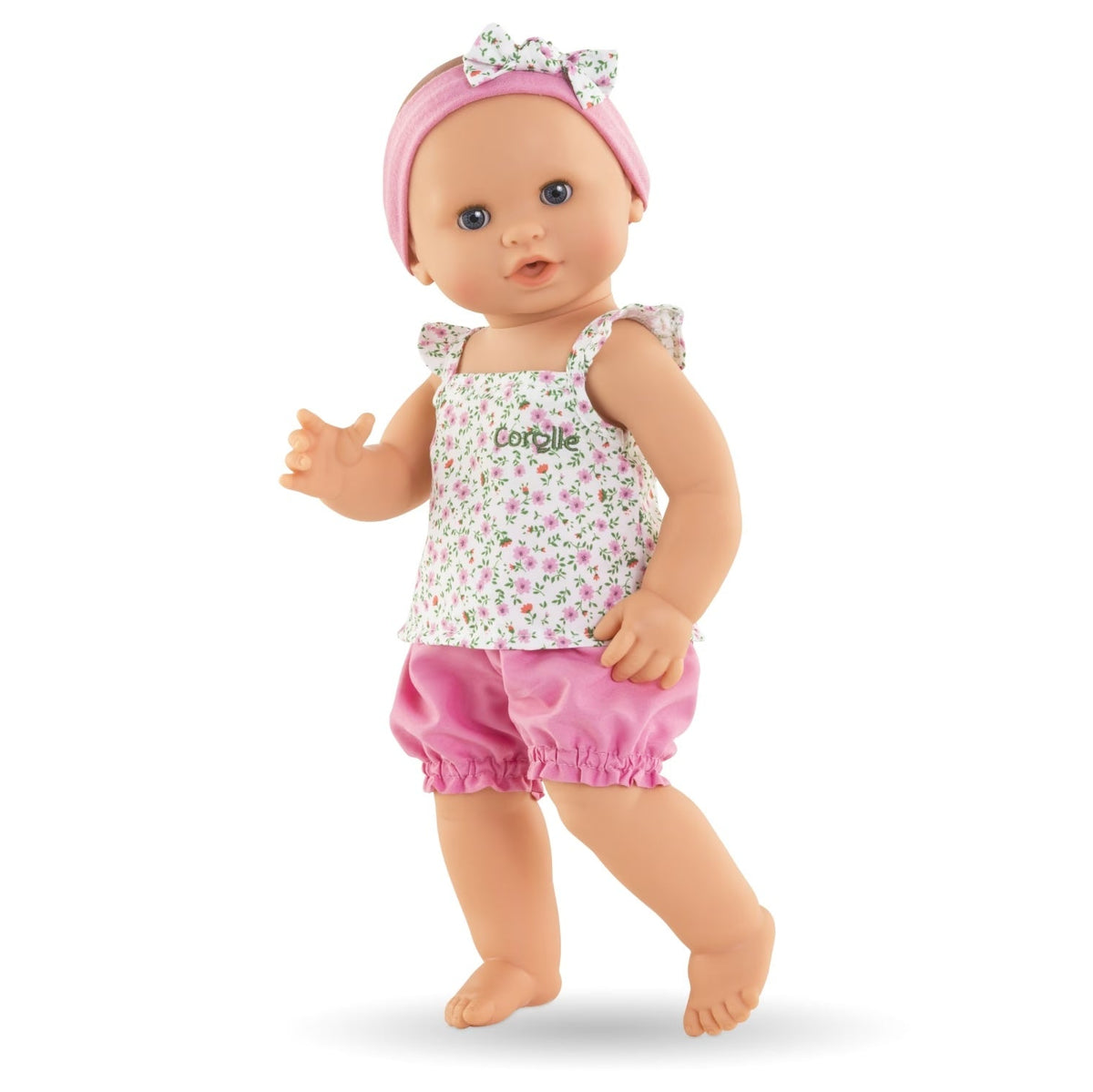 Corolle Emma 36cm Mon Grand Poupon baby doll standing with floral outfit and headband