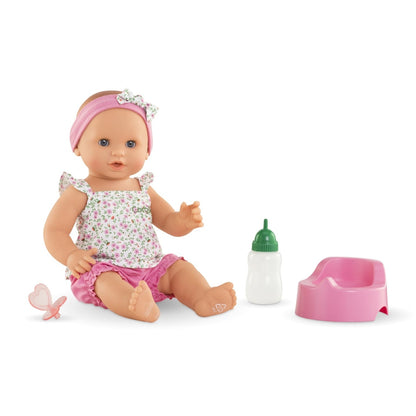 Corolle Emma Drink and Wet 36cm baby doll wearing floral outfit with bottle, potty and dummy