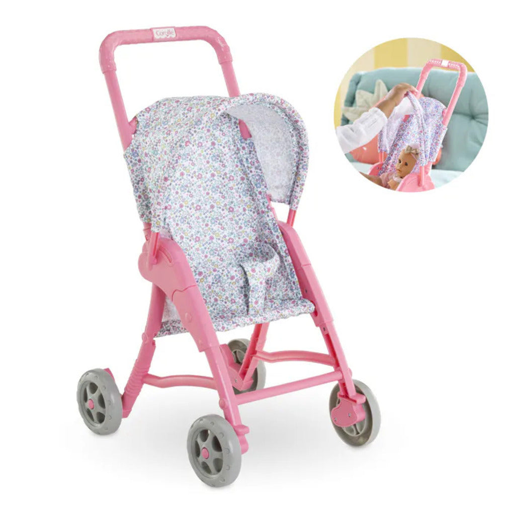 Side view of the Corolle flowered doll stroller showing the lightweight folding frame and wheels